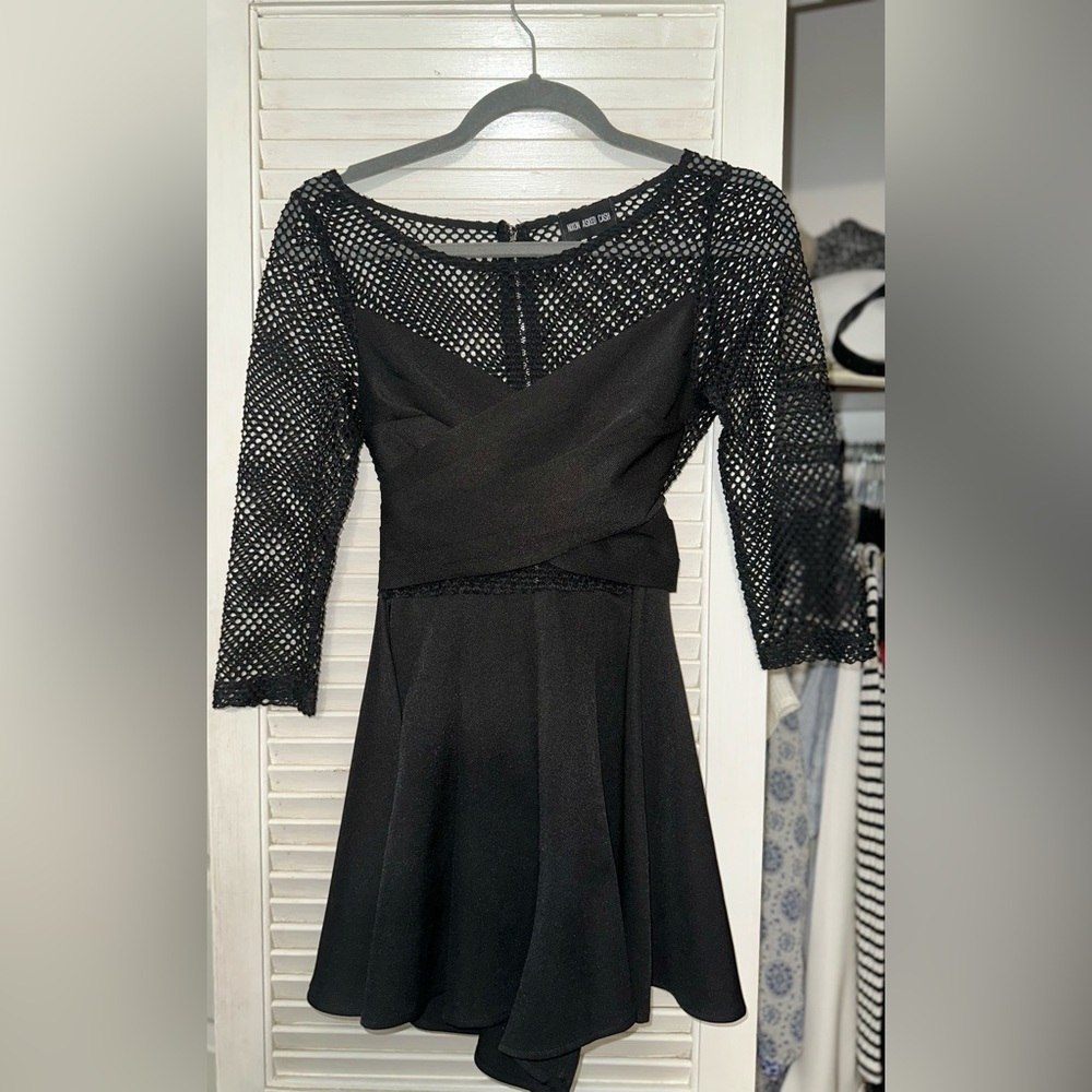 Boutique “Nixon Asked Cash” Black Wrap Romper
